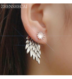 Boucles d'oreilles ailes d'ange en vente sur rosadestock