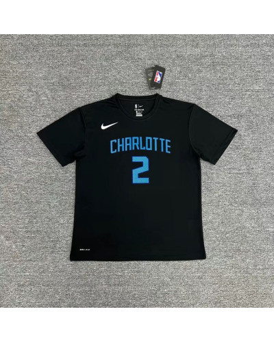 Men's Mitchell & Ness Larry Johnson Teal Charlotte Hornets Hardwood Classics Courtside Player T-Shirt